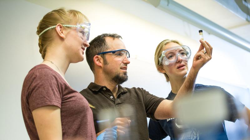 Stefan Debbert, Associate Professor of Chemistry, works with students.