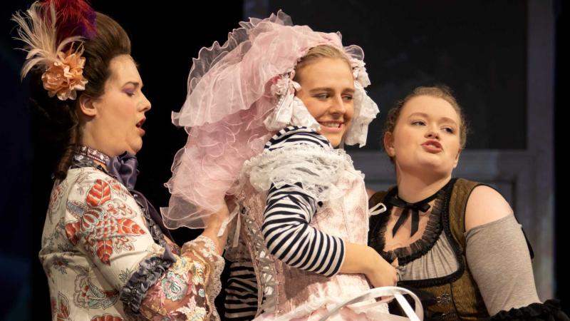 During rehearsals for the scene in the opera, Marriage of Figaro, where Countess Rosina dresses Cherubino.