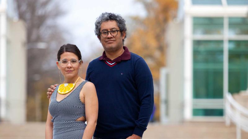 Horacia Conteras, and his partner, Natali Herrera-Pacheco stand together outside Lawrence's Conservatory