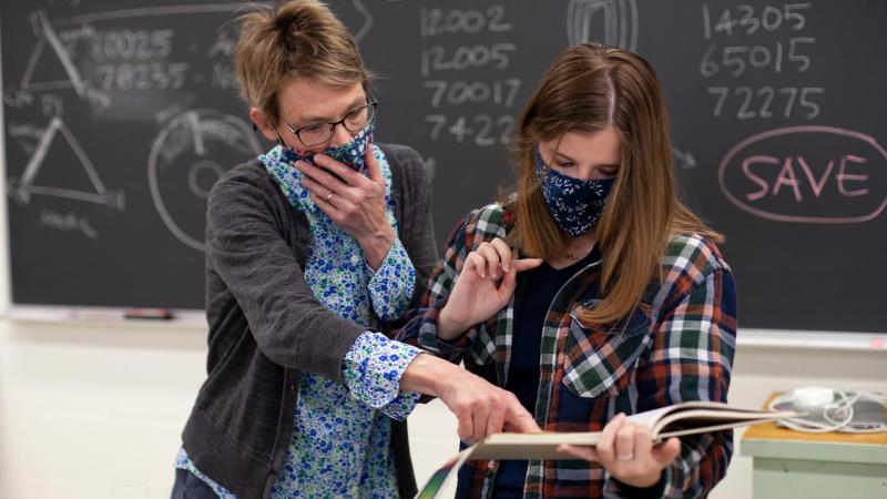 Marcia Bjornerud, Walter Schober Professor of Environmental Studies and Professor of Geosciences, works with Madeline Taylor ’23 during Hot Rocks