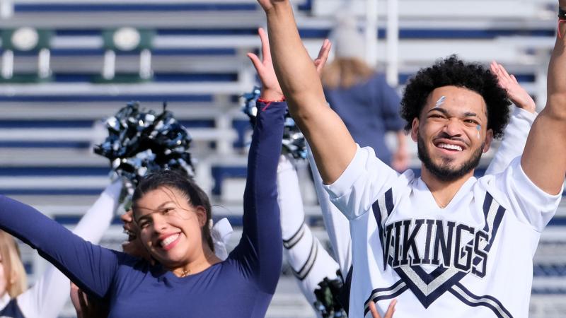 The Lawrence University dance team and cheerleaders perform at halftime during their football game against Beloit College