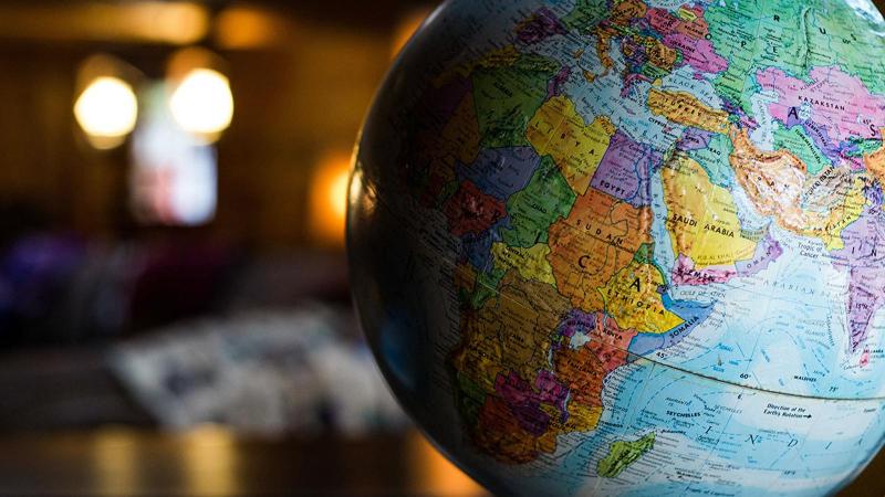 Close up of a globe on a desk