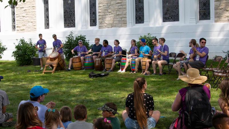 Music Education team teaches drumming during Mile of Music
