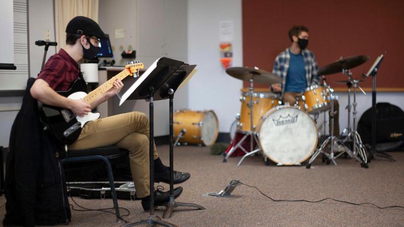 Student plays during a Lawrence University Jazz Ensemble rhythm section rehearsal 