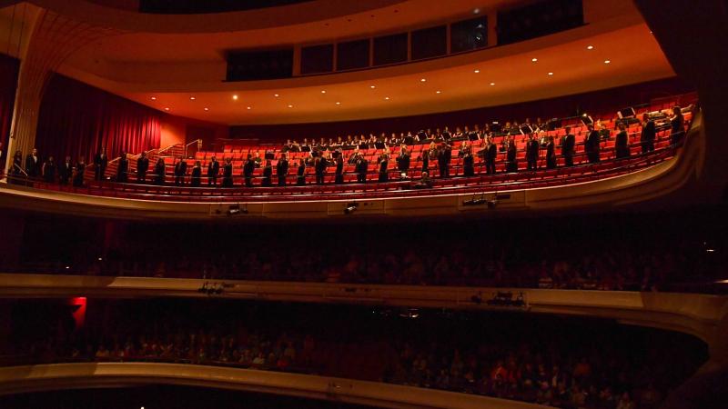 Singers perform from a balcony during Kaleidoscope 2017