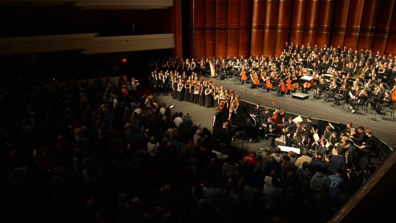 Wide view of entire Kaleidoscope performance and the crowd in auditorium