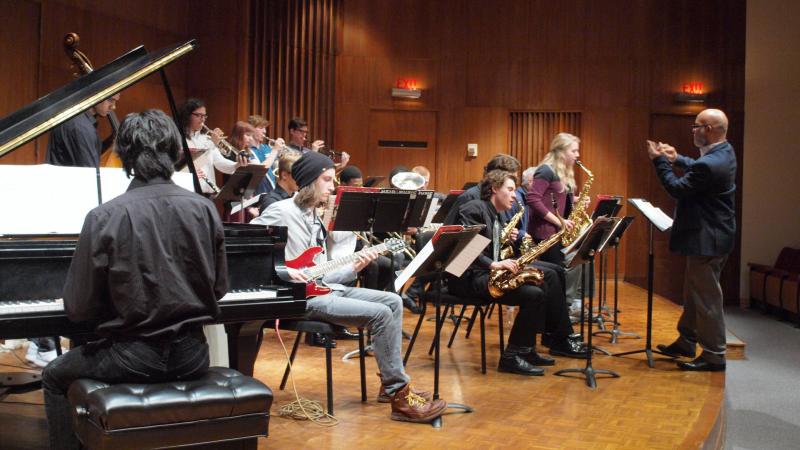 Members of Lawrence University's Jazz Workshop perform on stage.