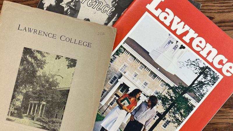 Archival covers from three magazines and pamphlets about Lawrence University.