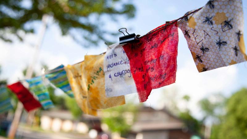 Flags strung up at the Esch Hurvis Center for Spiritual and Religious Life