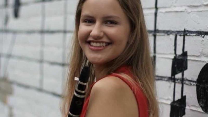 Emily Dorr poses with her clarinet.