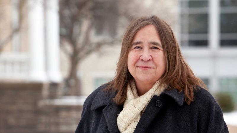 Karen Carr poses for a portrait on Main Hall Green.