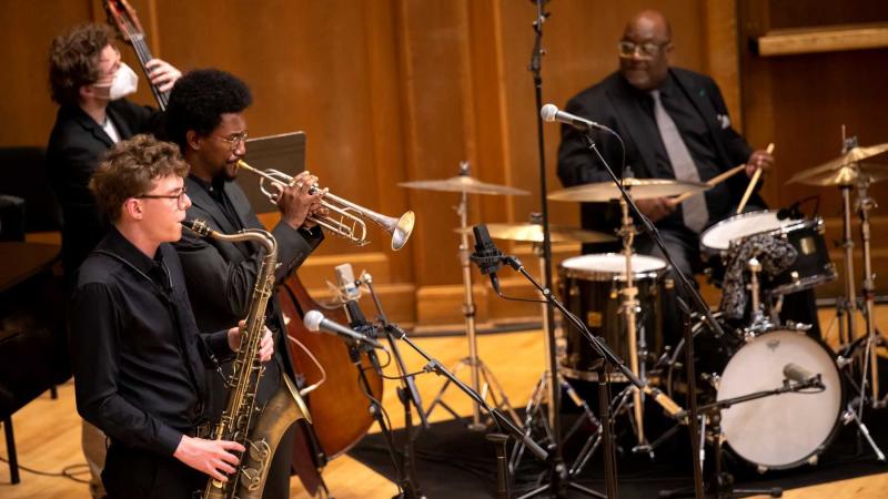 Alex Rothstein, Earl Simons, Aaron Brenton, and Carl Allen perform Blues March during the inauguration ceremony. 