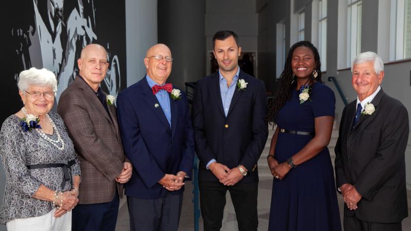 Alumni Award winners pose for a photo.