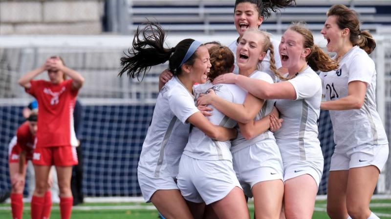 Lawrence's women's soccer team celebrates a game-winning goal.