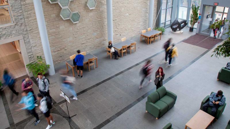 Students gather and move about in the Steitz atrium on first day of classes.