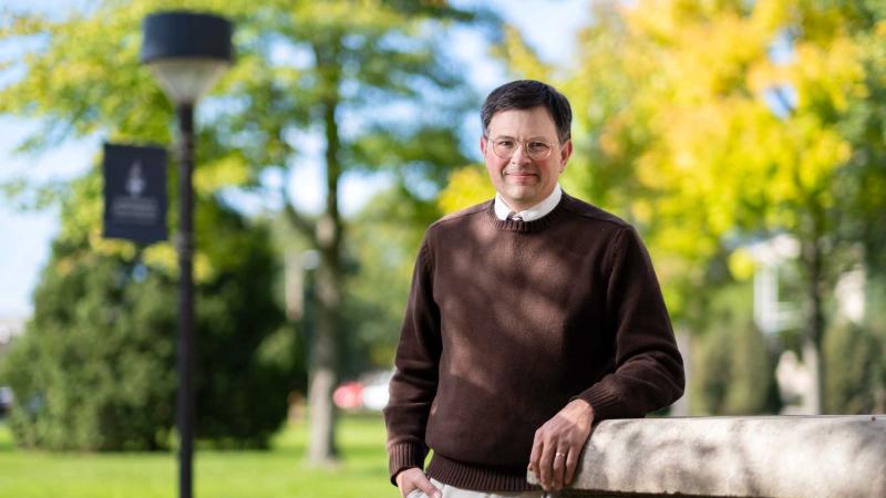 Arnold Shober poses for a photo on Main Hall Green.