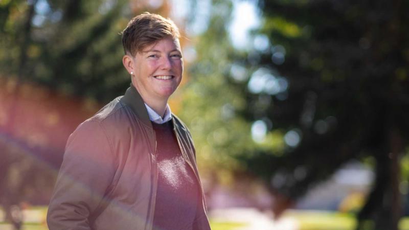 Constance Kassor poses for a portrait on Main Hall Green.