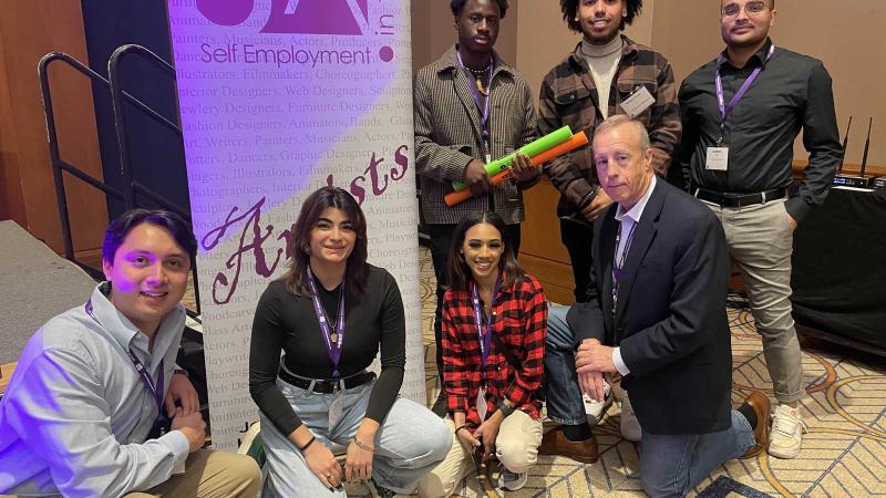 Innovation and Entrepreneurship students posing for picture with Gary Vaughn. Entrepreneurship majors, study entrepreneurship in college, and earn a business and entrepreneurship degree, while building their own business.