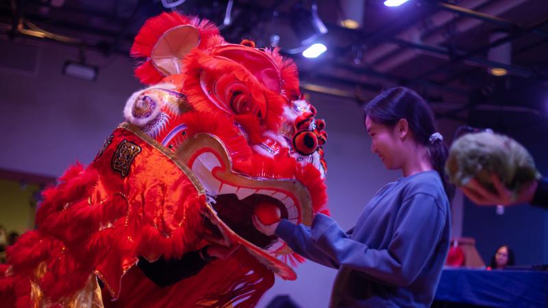 The Seven Star Lion Dance Group performs during a celebration of Lunar New Year in the Warch Campus Center Jan. 28. 