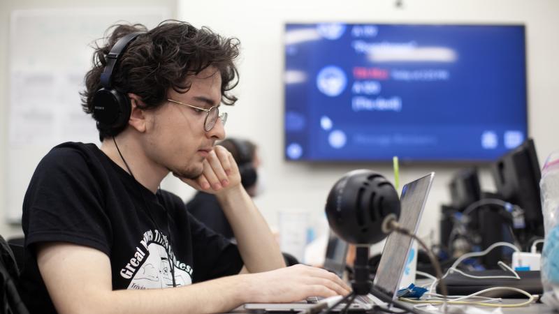 Matthew Carlson works as one of 12 trivia masters. (Photo by Danny Damiani)