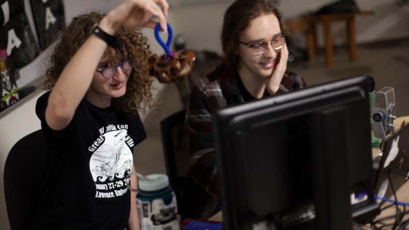 Willow Higgins and Nick Mayerson work the livestream during the Great Midwest Trivia Contest .