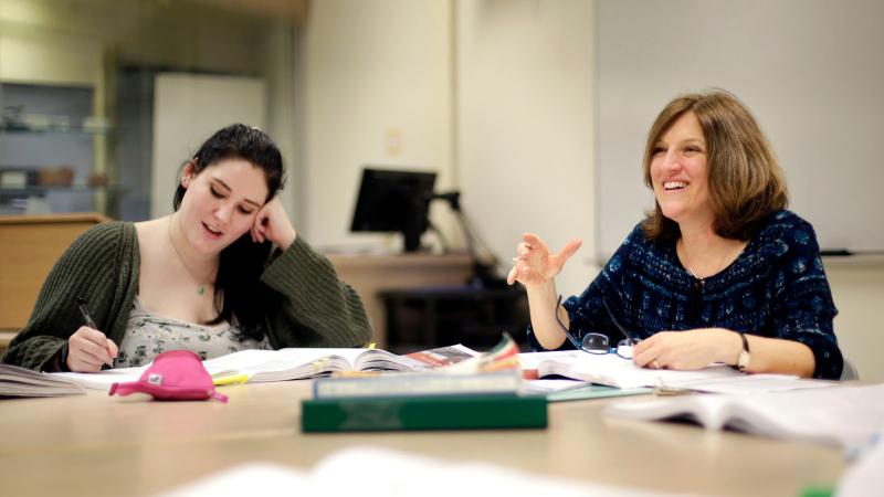 Teacher and student in anthropology class discussion