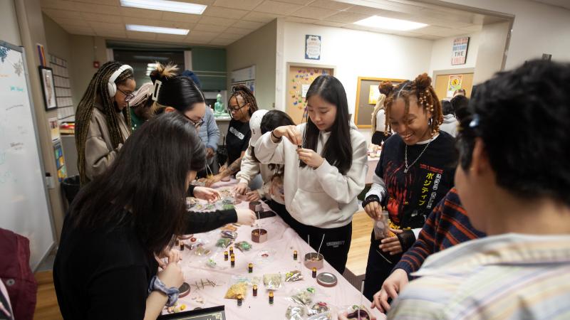 Students lineup to make candles at a Candles for Cuties event Wednesday in the Diversity & Intercultural Center.