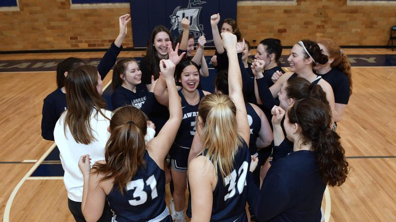 Lawrence Women's Basketball players celebrating