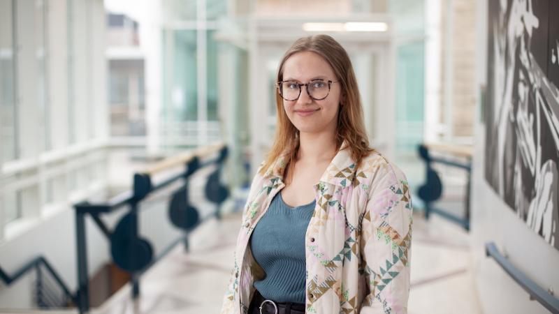 Emily Dorr poses for a portrait in the entryway of the Music-Drama Center.