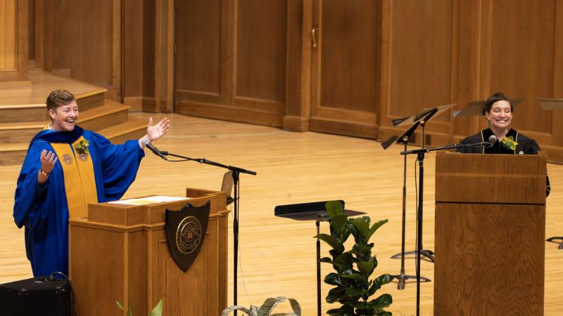 Constance Kassor, left, and Madera Allan share a laugh on stage at Memorial Chapel.