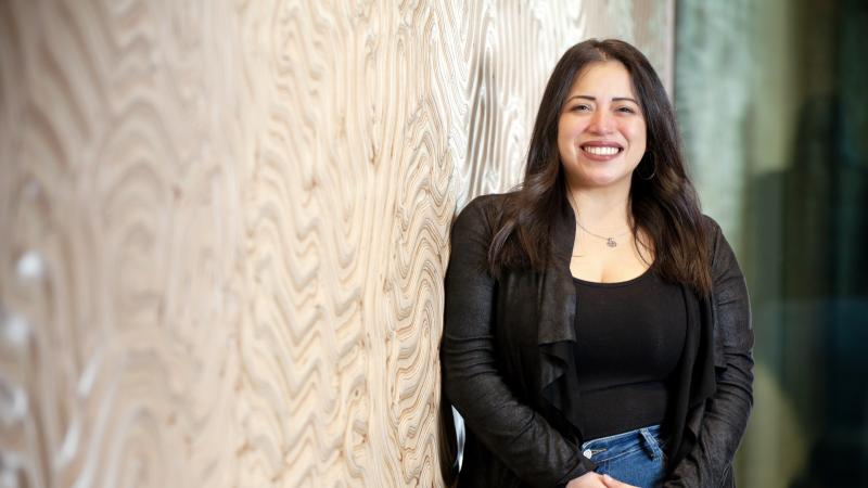 Noemi Delgado poses for a portrait in the hallway of the Center for Academic Success on the second floor of Mudd Library.