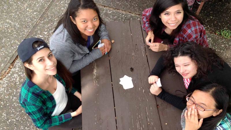 Summer Institute students playing cards