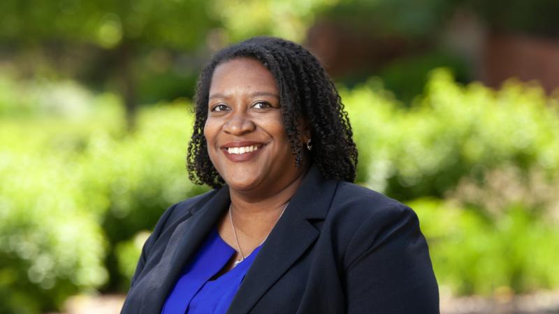 Terra Winston-Sage '00 poses for a portrait on campus.