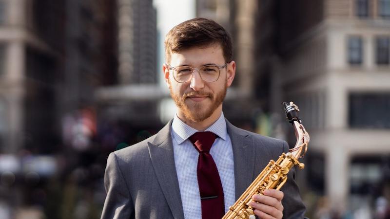 Joe Connor '16 holds his saxophone.