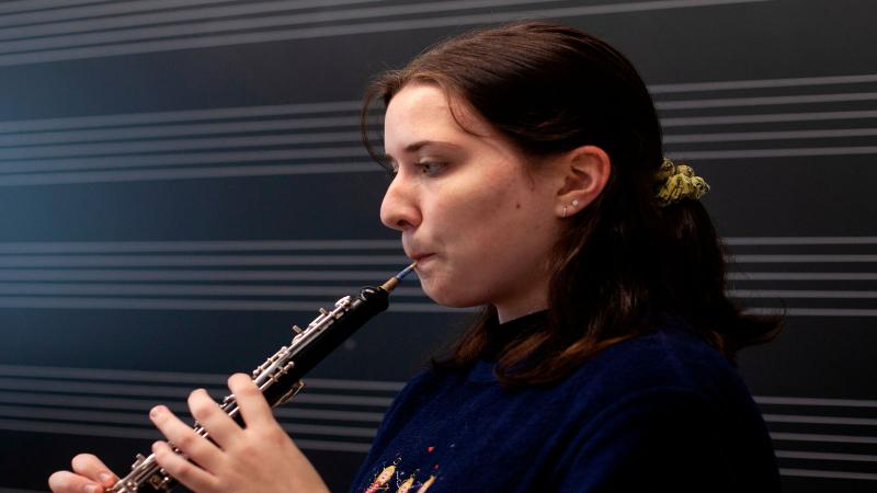 Student playing oboe