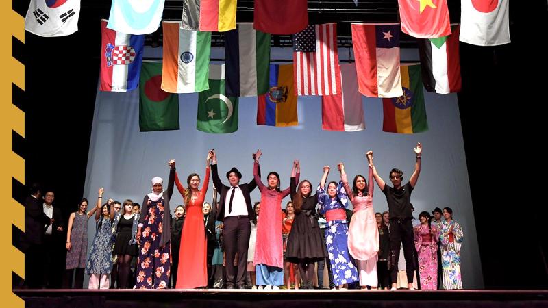 Student performers from Cabaret take a bow at the curtain call