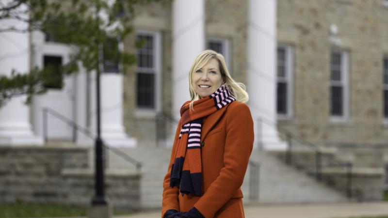 Judith Humphries poses for a portrait while standing in front of Main Hall.