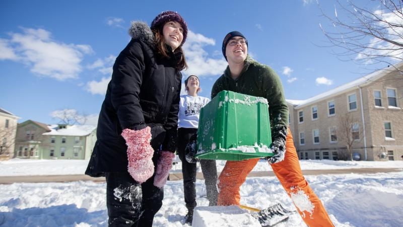 Students participate in a snow creation contest in The Quad.