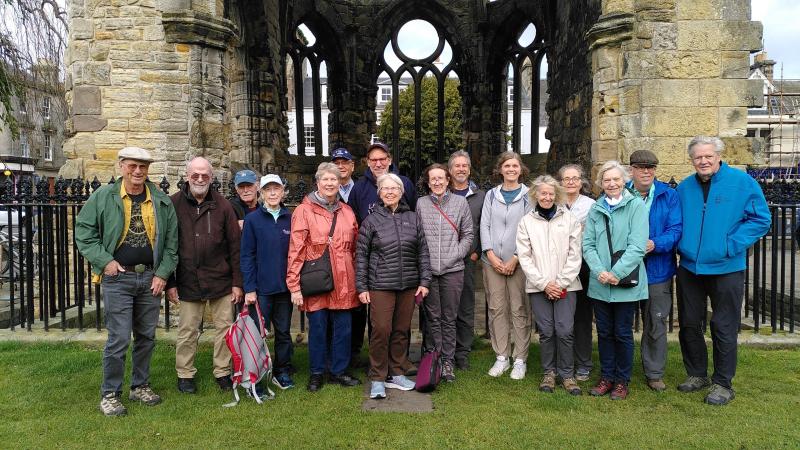 A Lawrence alumni group pose for a photo at St. Andrews in Northern Scotland.