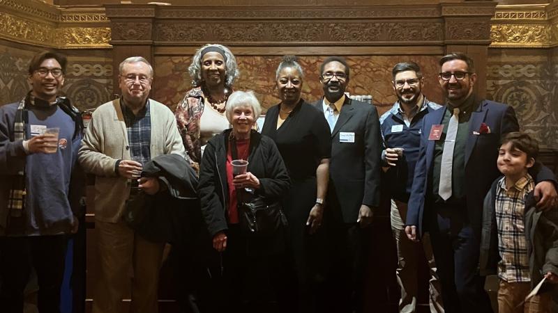 Alumni pose for a photo in Chicago.