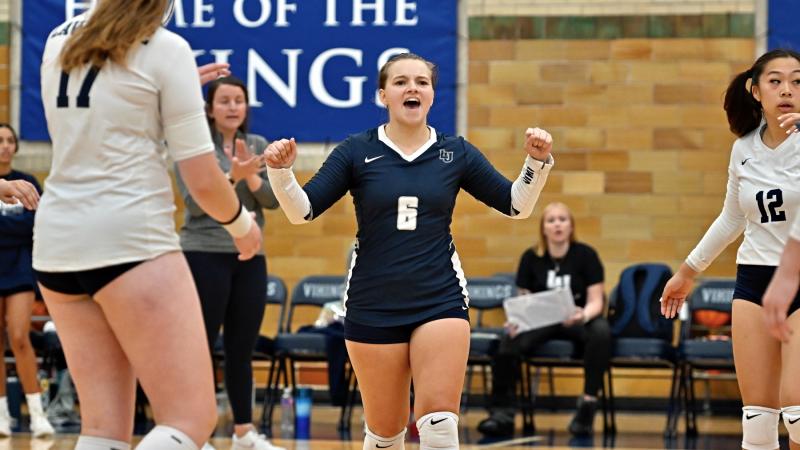 Taylor Hughes on the volleyball court in game action.
