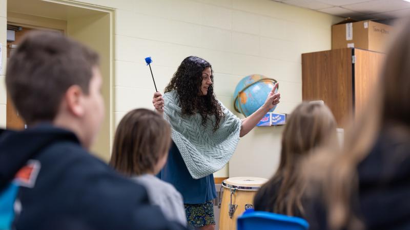 Leila Ramagopal Pertl leads students in song during a music class at Edison Elementary School in Appleton. 