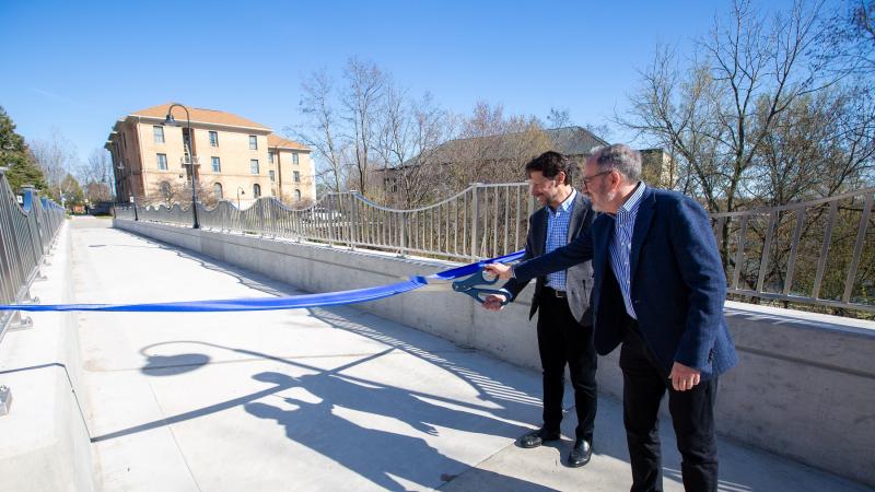 David Calle and Mark Burstein cut the ribbon on the Calle Burstein Crossing.