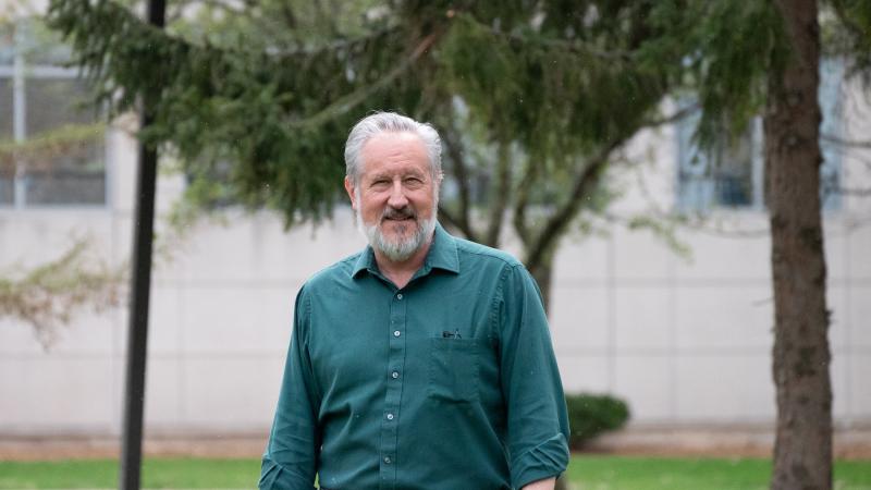 Edmund Kern poses for a photo on Main Hall Green.