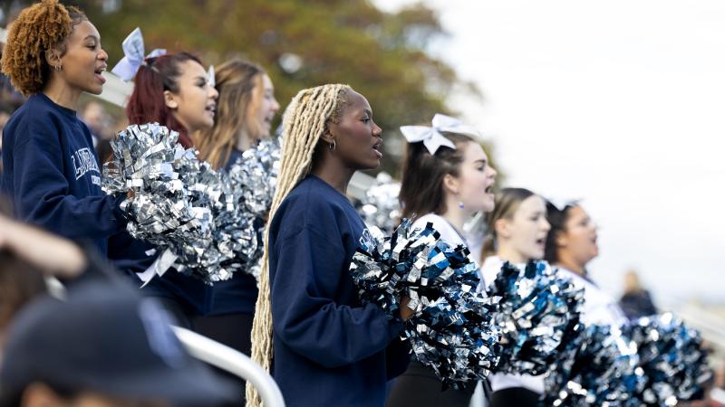 Cheerleaders root on the Vikings during the 2023 Homecoming football game.