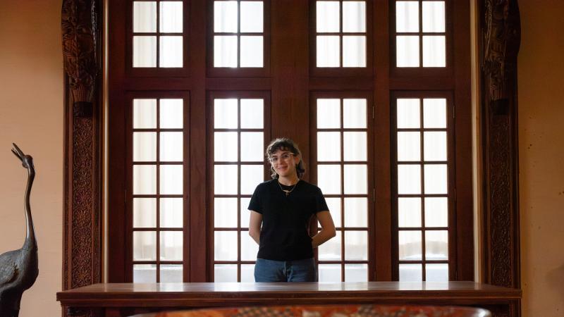 Emma Jacobs poses for a photo in Teakwood Room.