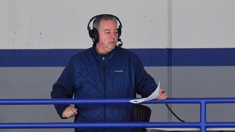 Joe Vanden Acker calls a Lawrence hockey game on a webcast. 