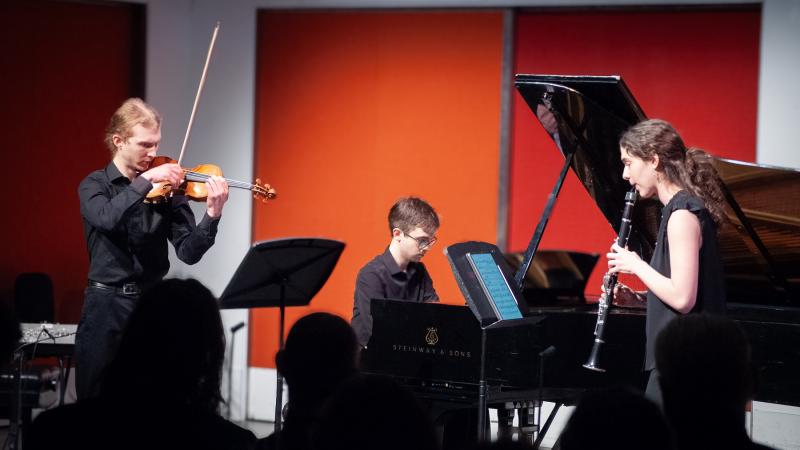 Lawrence students Ben Frueh on violin, Isaac Epley on piano, and Isabelle Olsen on clarinet perform during a recital at Manhattan School of Music in New York City. (Photo by Sarah Pedlar '25)