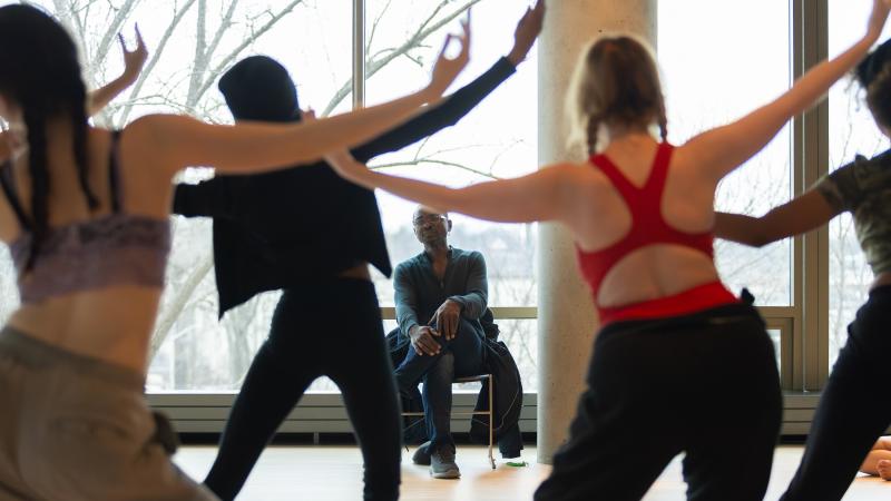Robert Battle leads students in dance instruction in Warch Campus Center.