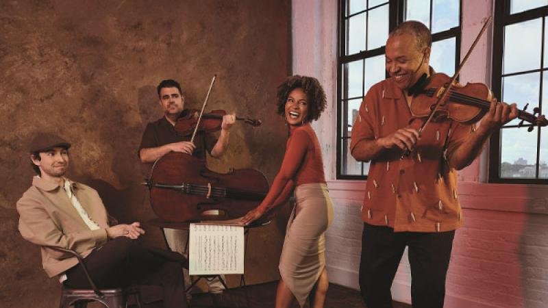 Harlem Quartet playing instruments